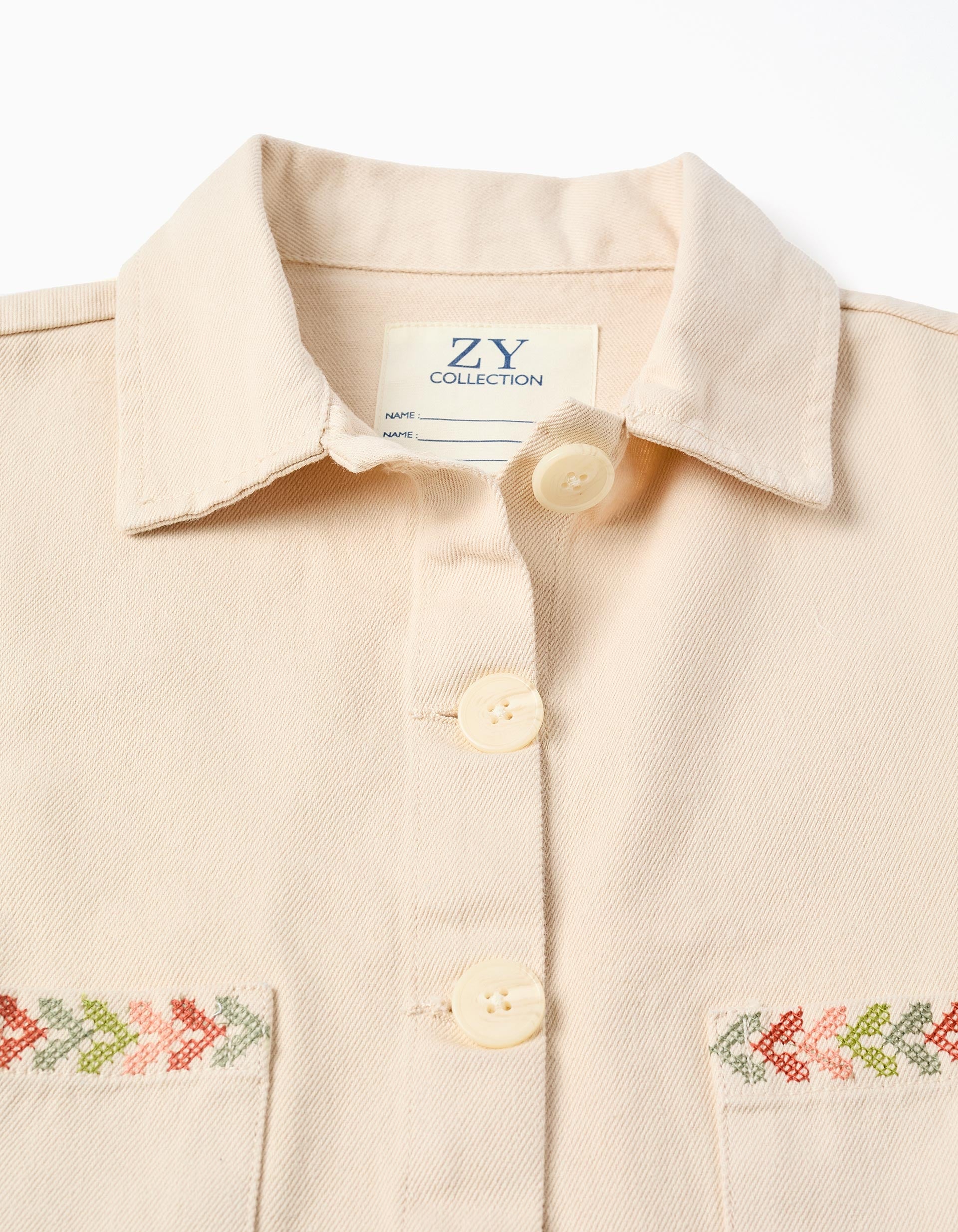 Chaqueta de sarga con bordados en punto de cruz para niña, beige claro